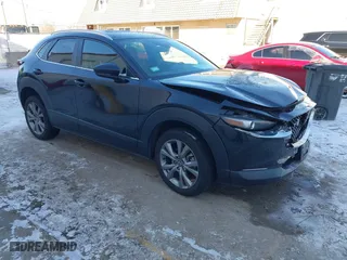 2023 Mazda CX-30 2.5 S Preferred Package with VIN 3MVDMBCM4PM543809, listed as a IAAI auction lot 41249179 with 25,590 mi miles. Bid and sale history available at carsss.com. Image 1.