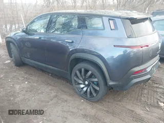 2023 Fisker Ocean One z VIN VCF1ZBU24PG005236, wystawiony jako IAAI lot #41380824 z przebiegiem 7975 mil mil oraz . Historia ofert i sprzedaży dostępna na DreamBid. Obrazek 3.