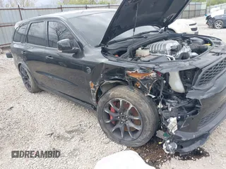 2021 Dodge Durango SRT Hellcat with VIN 1C4SDJH91MC682235, listed as a IAAI auction lot 42029380 with 9,921 mi miles and . Bid and sale history available at DreamBid. Image 17.