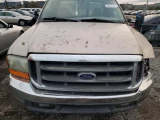 1999 Ford Super Duty F-250 XL with VIN 1FTNX20S2XEA58333, listed as a Copart auction lot 66022572 with 290,286 mi miles and Salvage Title. Bid and sale history available at carsss.com. Image 11.