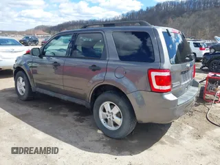 2012 Ford Escape XLT with VIN 1FMCU0D76CKC01916, listed as a IAAI auction lot 41879331 with 194,201 mi miles. Bid and sale history available at carsss.com. Image 3.