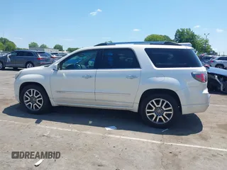 2014 GMC Acadia Denali with VIN 1GKKVTKD1EJ220183, listed as a IAAI auction lot 42230611 with 103,789 mi miles and . Bid and sale history available at carsss.com. Image 14.