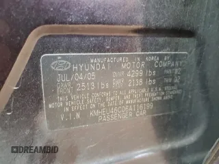 2006 Hyundai Sonata GLS z VIN KMHEU46C06A116199, wystawiony jako Copart lot #53669785 z przebiegiem 290 545 mil mil oraz Szkoda całkowita • Salvage title. Historia ofert i sprzedaży dostępna na DreamBid. Obrazek 12.