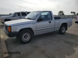 1988 Mitsubishi Mighty Max z VIN JA7FL24D2JP013297, wystawiony jako Copart lot #79533724 z przebiegiem 117 397 mil mil oraz Tytuł czysty. Historia ofert i sprzedaży dostępna na DreamBid. Obrazek 1.