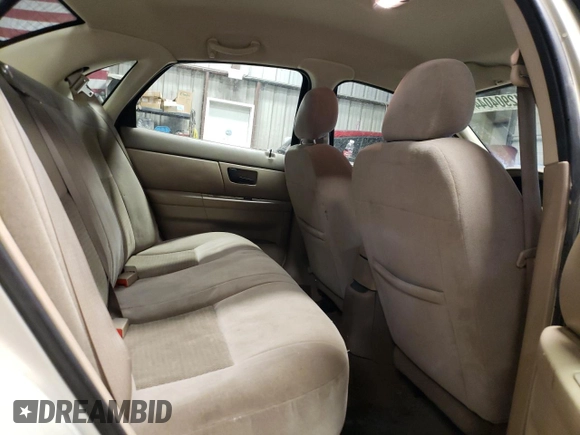 2004 Ford Taurus SE with VIN 1FAFP53U74G122231, listed as a Copart auction lot 42904044 with 116,851 mi miles and Salvage Title. Bid and sale history available at DreamBid. Image 10.