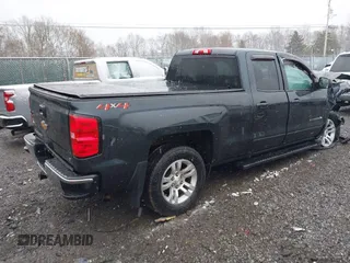 2018 Chevrolet Silverado 1500 LT with VIN 2GCVKREC6J1102304, listed as a IAAI auction lot 41800456 with 82,000 mi miles and . Bid and sale history available at DreamBid. Image 4.