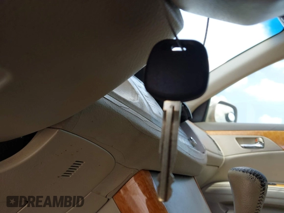 2005 Toyota Avalon XL with VIN 4T1BK36B15U007967, listed as a IAAI auction lot 42060604 with 286,766 mi miles and . Bid and sale history available at DreamBid. Image 11.