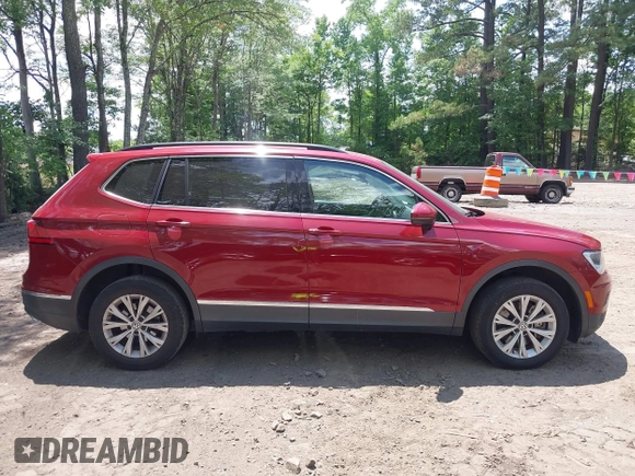 2018 Volkswagen Tiguan SEL with VIN 3VV3B7AX6JM073546, listed as a IAAI auction lot 42439602 with 97,109 mi miles and . Bid and sale history available at DreamBid. Image 13.