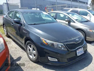 2015 Kia Optima LX with VIN 5XXGM4A79FG517083, listed as a IAAI auction lot 41805370 with 77,800 mi miles. Bid and sale history available at carsss.com. Image 1.