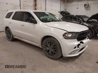 2016 Dodge Durango R/T with VIN 1C4SDJCT2GC363143, listed as a IAAI auction lot 41740548 with 115,774 mi miles and . Bid and sale history available at DreamBid. Image 1.