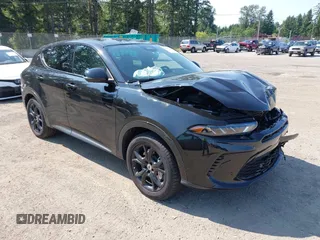 2024 Dodge Hornet R/T Plus with VIN ZACPDFDWXR3A22378, listed as a IAAI auction lot 42408784 with 5,472 mi miles and . Bid and sale history available at DreamBid. Image 1.