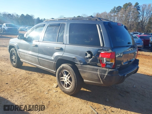 2004 Jeep Grand Cherokee Laredo z VIN 1J4GW48S24C159370, wystawiony jako IAAI lot #41296094 z przebiegiem 138 296 mil mil oraz . Historia ofert i sprzedaży dostępna na DreamBid. Obrazek 3.