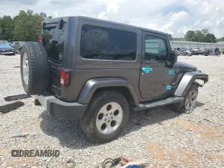 2014 Jeep Wrangler Sahara with VIN 1C4AJWBG8EL248291, listed as a Copart auction lot 60611345 with 84,777 mi miles and Salvage title. Bid and sale history available at DreamBid. Image 3.