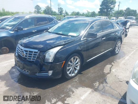 2013 Cadillac XTS Luxury z VIN 2G61P5S37D9101989, wystawiony jako IAAI lot #42242641 z przebiegiem 243 006 mil mil oraz . Historia ofert i sprzedaży dostępna na DreamBid. Obrazek 17.