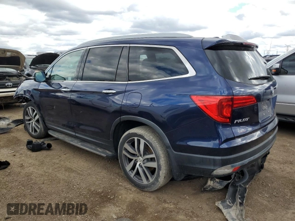 2016 Honda Pilot Touring with VIN 5FNYF6H90GB024916, listed as a Copart auction lot 53024175 with 132,295 mi miles and Salvage Title. Bid and sale history available at DreamBid. Image 2.
