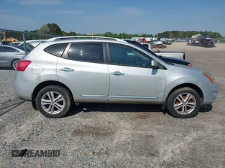 2013 Nissan Rogue S with VIN JN8AS5MV1DW645281, listed as a IAAI auction lot 42035789 with 124,423 mi miles and . Bid and sale history available at DreamBid. Image 14.