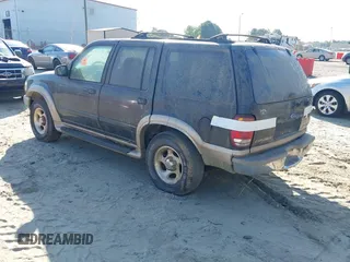 1999 Ford Explorer XLT z VIN 1FMZU32EXXZA93195, wystawiony jako IAAI lot #42830694 z przebiegiem 286 095 mil mil oraz . Historia ofert i sprzedaży dostępna na DreamBid. Obrazek 3.