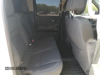 2023 Nissan Frontier SV z VIN 1N6ED1FK1PN665928, wystawiony jako Copart lot #52036625 z przebiegiem 23 760 mil mil oraz Szkoda całkowita • Salvage title. Historia ofert i sprzedaży dostępna na DreamBid. Obrazek 10.