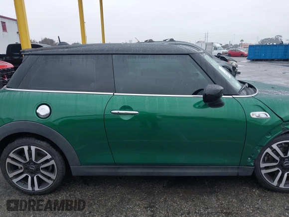 2020 MINI Hardtop Cooper S z VIN WMWXR5C08L2L85651, wystawiony jako IAAI lot #41521346 z przebiegiem 40 863 mil mil oraz . Historia ofert i sprzedaży dostępna na DreamBid. Obrazek 14.