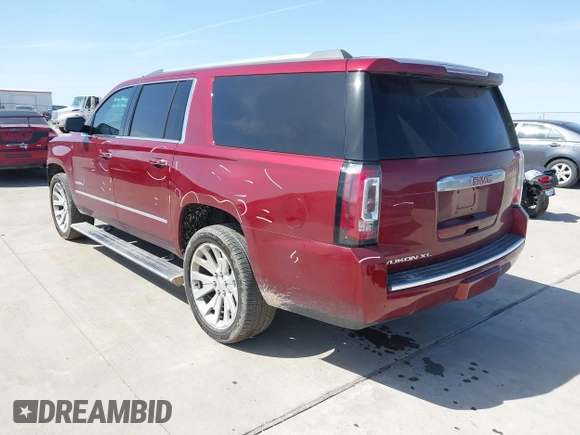 2020 GMC Yukon XL Denali with VIN 1GKS1HKJ3LR238701, listed as a IAAI auction lot 41724274 with 107,323 mi miles and . Bid and sale history available at DreamBid. Image 3.