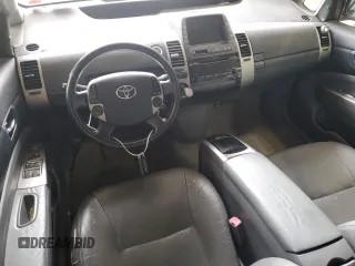 2006 Toyota Prius z VIN JTDKB20U563146130, wystawiony jako Copart lot #58481625 z przebiegiem Nie podano mil oraz Czysty tytuł • Clean title. Historia ofert i sprzedaży dostępna na DreamBid. Obrazek 8.