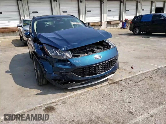 2020 Ford Escape SEL with VIN 1FMCU0H63LUA08628, listed as a Copart auction lot 60546095 with 33,439 mi miles and Salvage title. Bid and sale history available at DreamBid. Image 14.