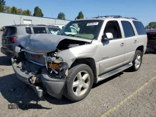 2005 GMC Yukon Denali z VIN 1GKEK63U25J109888, wystawiony jako Copart lot #69428374 z przebiegiem Nie podano mil oraz Szkoda całkowita • Salvage title. Historia ofert i sprzedaży dostępna na DreamBid. Obrazek 1.