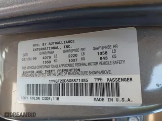 1999 Mazda 626 LX with VIN 1YVGF22D8X5871485, listed as a IAAI auction lot 41641049 with 115,603 mi miles. Bid and sale history available at carsss.com. Image 9.