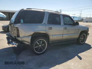 2002 Chevrolet Tahoe LS с VIN 1GNEC13T62R243097, выставлен на аукционе Copart как лот 64210815 с пробегом 254 318 миль миль и Списание • Salvage title. История ставок и продаж доступна на DreamBid. Изображение 3.