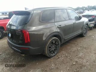 2021 Kia Telluride EX with VIN 5XYP3DHC1MG128114, listed as a IAAI auction lot 42699570 with 92,775 mi miles and . Bid and sale history available at DreamBid. Image 4.