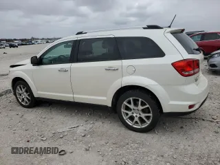 2014 Dodge Journey R/T with VIN 3C4PDDFG1ET176774, listed as a Copart auction lot 52140875 with 100,260 mi miles and Clean title. Bid and sale history available at DreamBid. Image 2.
