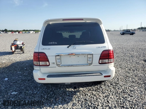 2006 Lexus LX 470 z VIN JTJHT00W864007291, wystawiony jako Copart lot #57331555 z przebiegiem 142 194 mil mil oraz Szkoda całkowita • Salvage title. Historia ofert i sprzedaży dostępna na DreamBid. Obrazek 6.