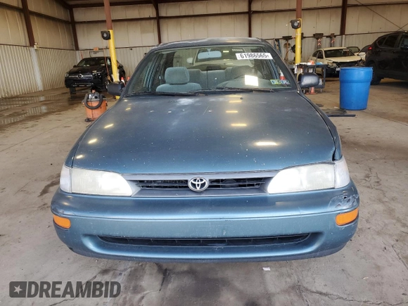 1995 Toyota Corolla DX с VIN 2T1AE09B9SC116574, выставлен на аукционе Copart как лот 61986565 с пробегом 189 044 миль миль и Списание • Salvage title. История ставок и продаж доступна на DreamBid. Изображение 5.