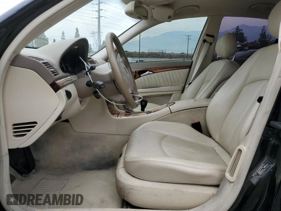 2003 Mercedes-Benz E-Class 5.0L with VIN WDBUF70J53A146263, listed as a Copart auction lot 62768664 with 73,790 mi miles and Salvage Title. Bid and sale history available at carsss.com. Image 7.