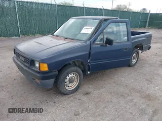 1992 Isuzu Pickup S z VIN 4S1CL11L6N4220965, wystawiony jako IAAI lot #41884618 z przebiegiem 212 385 mil mil oraz . Historia ofert i sprzedaży dostępna na DreamBid. Obrazek 2.