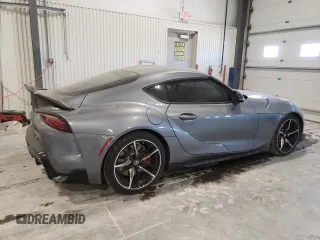 2022 Toyota GR Supra 3.0 with VIN WZ1DB0C03NW052512, listed as a Copart auction lot 86583474 with 5,774 mi miles and Salvage Title. Bid and sale history available at carsss.com. Image 3.