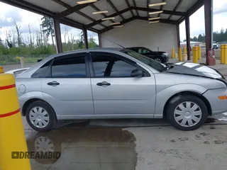 2006 Ford Focus S z VIN 1FAFP34N66W141597, wystawiony jako IAAI lot #42301819 z przebiegiem 94 705 mil mil oraz . Historia ofert i sprzedaży dostępna na DreamBid. Obrazek 14.