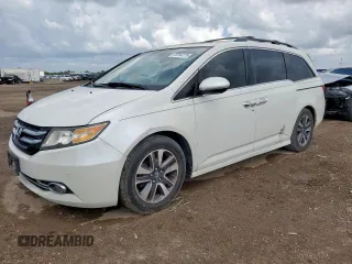 2014 Honda Odyssey Touring with VIN 5FNRL5H98EB050328, listed as a Copart auction lot 64764775 with 120,828 mi miles and Clean title. Bid and sale history available at DreamBid. Image 1.