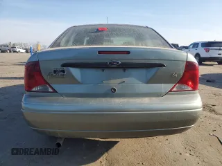 2004 Ford Focus SE with VIN 1FAFP34314W127053, listed as a Copart auction lot 48652265 with 241,841 mi miles and Salvage title. Bid and sale history available at DreamBid. Image 6.