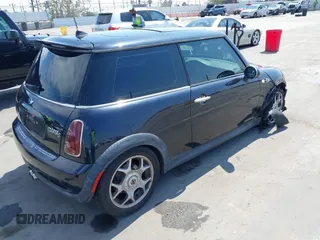 2006 MINI Hardtop S with VIN WMWRE33596TJ35502, listed as a IAAI auction lot 42474204 with 126,938 mi miles and . Bid and sale history available at DreamBid. Image 4.