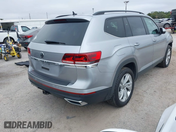 2021 Volkswagen Atlas SE with VIN 1V2JR2CA7MC556268, listed as a IAAI auction lot 41185525 with 73,724 mi miles and . Bid and sale history available at DreamBid. Image 4.