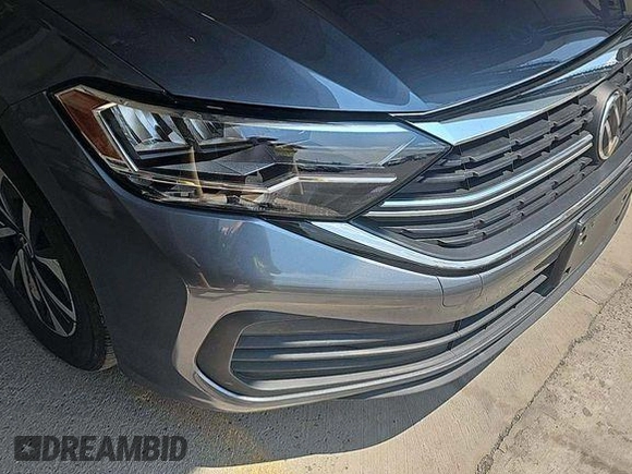 2024 Volkswagen Jetta S with VIN 3VW5M7BU2RM043054, listed as a IAAI auction lot 42852875 with 27,670 mi miles and . Bid and sale history available at DreamBid. Image 4.