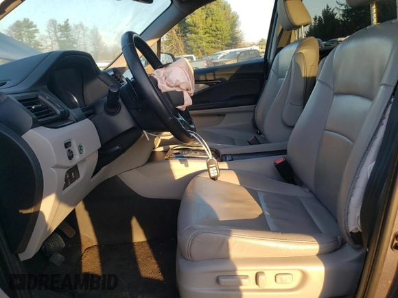 2020 Honda Pilot Touring 8-Passenger with VIN 5FNYF6H92LB031005, listed as a Copart auction lot 49545335 with 59,789 mi miles and Salvage Title. Bid and sale history available at DreamBid. Image 7.