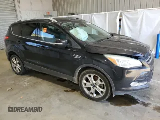 2016 Ford Escape Titanium with VIN 1FMCU0J91GUB09161, listed as a Copart auction lot 50027315 with 106,784 mi miles and Salvage Title. Bid and sale history available at carsss.com. Image 4.