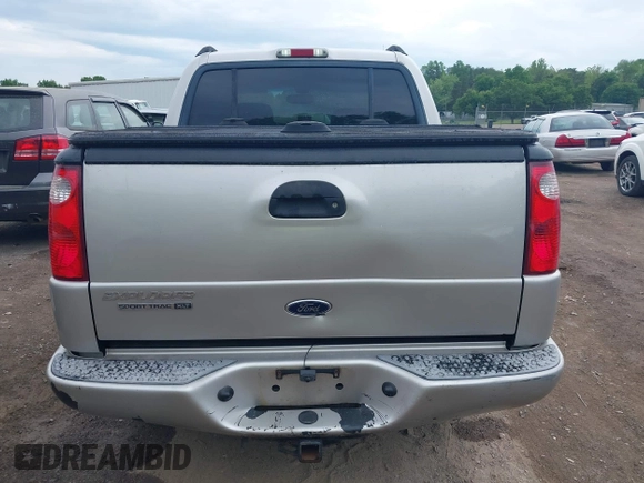 2004 Ford Explorer Sport Trac XLS z VIN 1FMDU77K74UA77223, wystawiony jako IAAI lot #42167996 z przebiegiem Nie podano mil oraz . Historia ofert i sprzedaży dostępna na DreamBid. Obrazek 16.