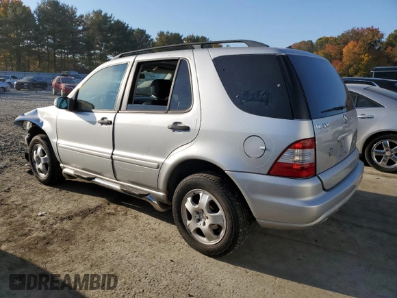 2002 Mercedes-Benz M-Class with VIN 4JGAB54E32A365833, listed as a Copart auction lot 76158434 with 175,244 mi miles and Salvage Title. Bid and sale history available at carsss.com. Image 2.