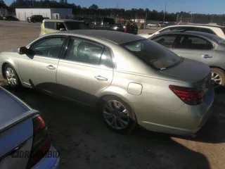 2008 Toyota Avalon XL with VIN 4T1BK36BX8U314798, listed as a IAAI auction lot 40923920 with 128,254 mi miles. Bid and sale history available at carsss.com. Image 3.