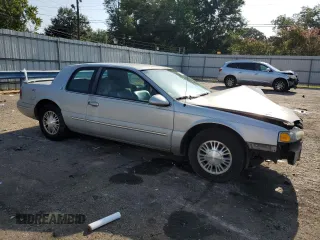 1997 Mercury Cougar z VIN 1MELM6245VH627028, wystawiony jako Copart lot #65533884 z przebiegiem 74 360 mil mil oraz Szkody całkowita. Historia ofert i sprzedaży dostępna na DreamBid. Obrazek 4.