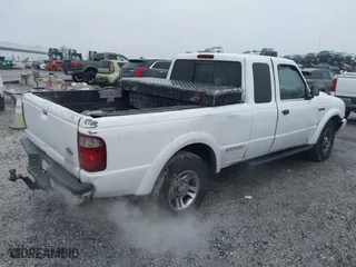 2002 Ford Ranger XL Fleet with VIN 1FTYR44U32PA59454, listed as a IAAI auction lot 41406926 with 241,534 mi miles. Bid and sale history available at carsss.com. Image 4.