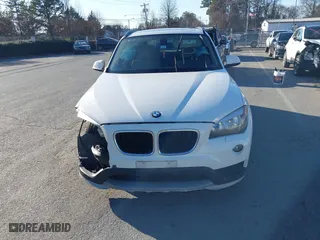 2015 BMW X1 xDrive28i with VIN WBAVL1C50FVY26009, listed as a IAAI auction lot 41495667 with 109,807 mi miles. Bid and sale history available at carsss.com. Image 12.